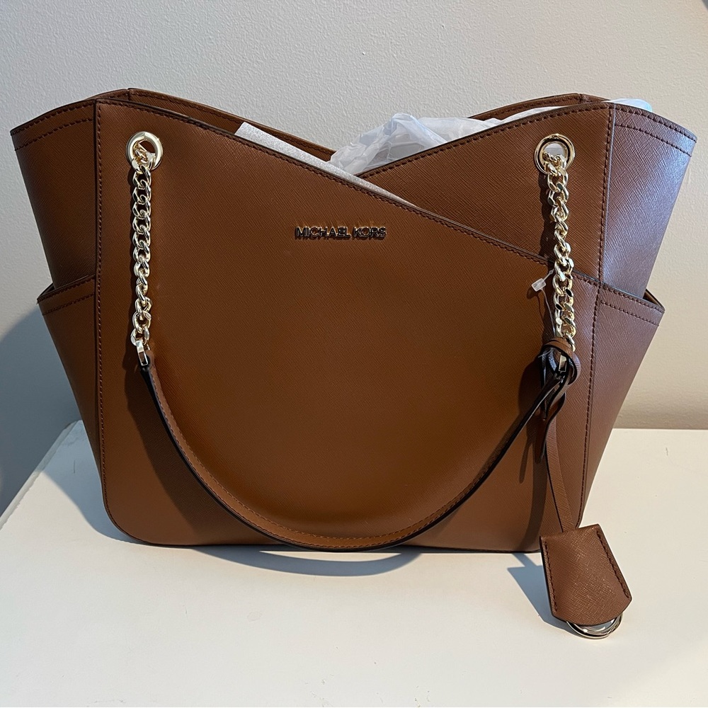Brown Leather a Michael Kors Purse (never used, perfect condition)